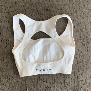 White NVGTN sports bra barely worn size:small